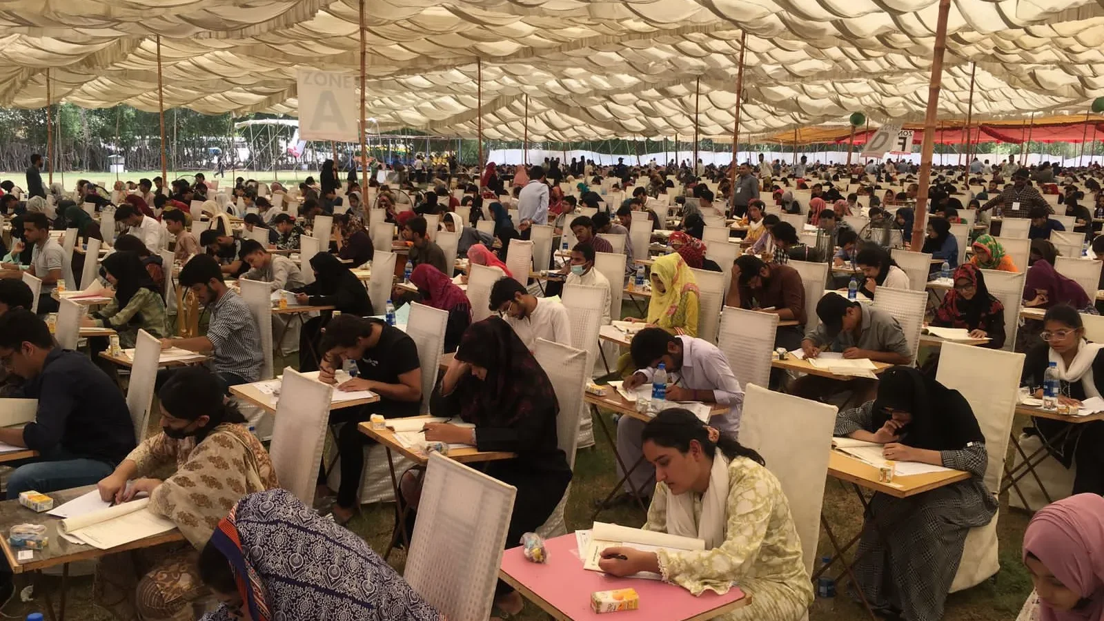 MCQs for Competitive Exams 3 Candidates are appearing in a test and answering MCQS for Competitive exam.